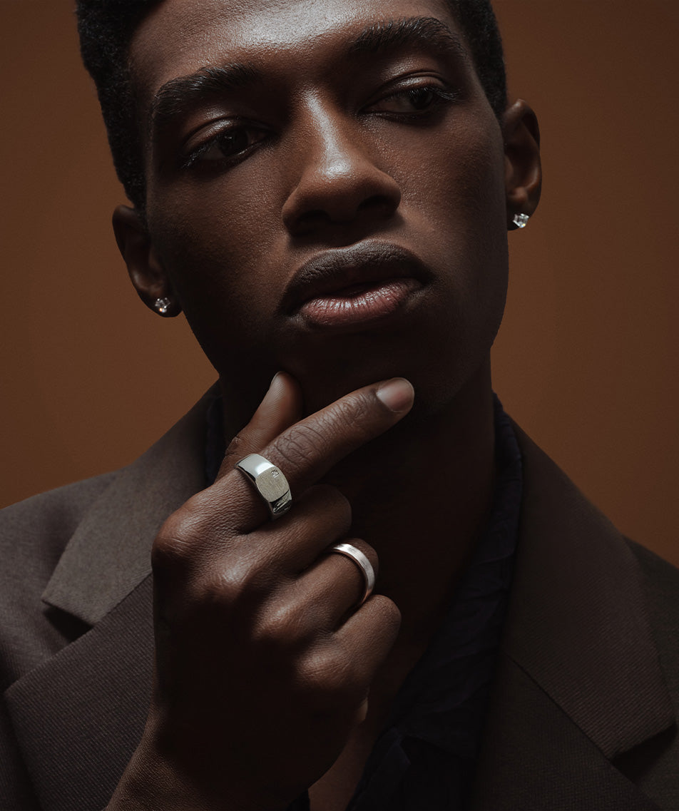 Portrait of a man wearing a signet ring