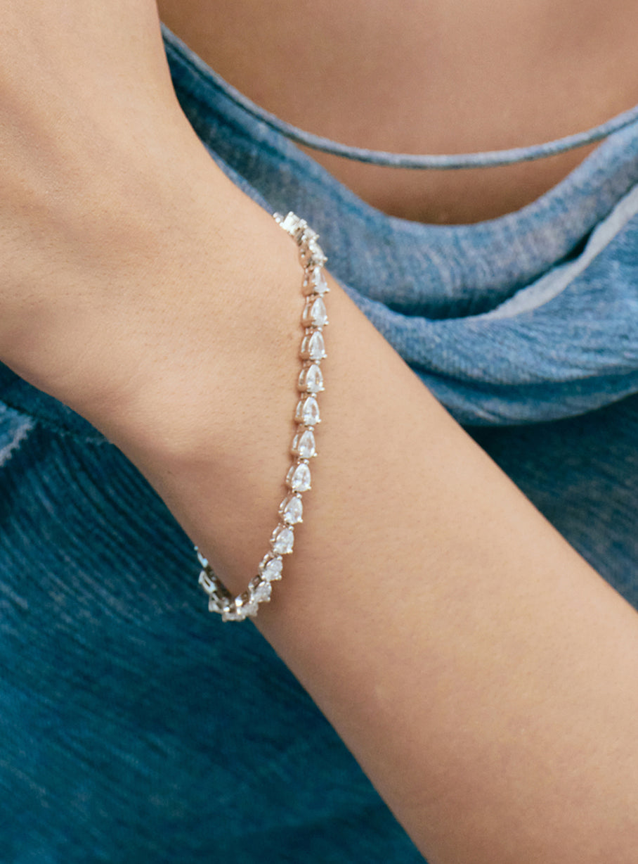 Single pear tennis bracelet worn solo