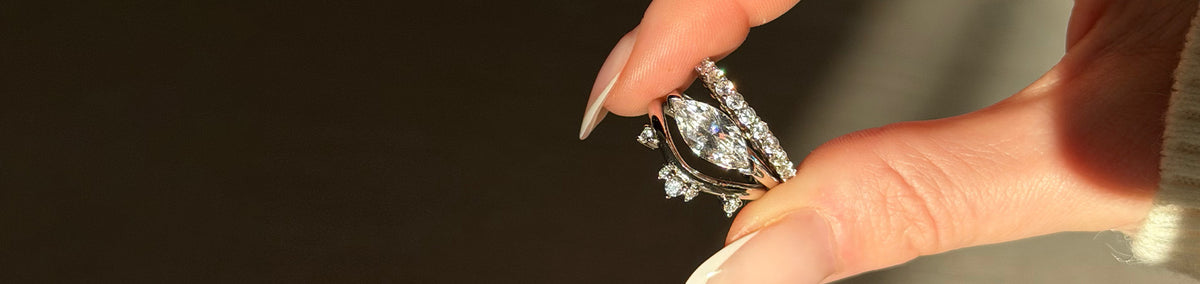 Hand wearing stacked divorce rings