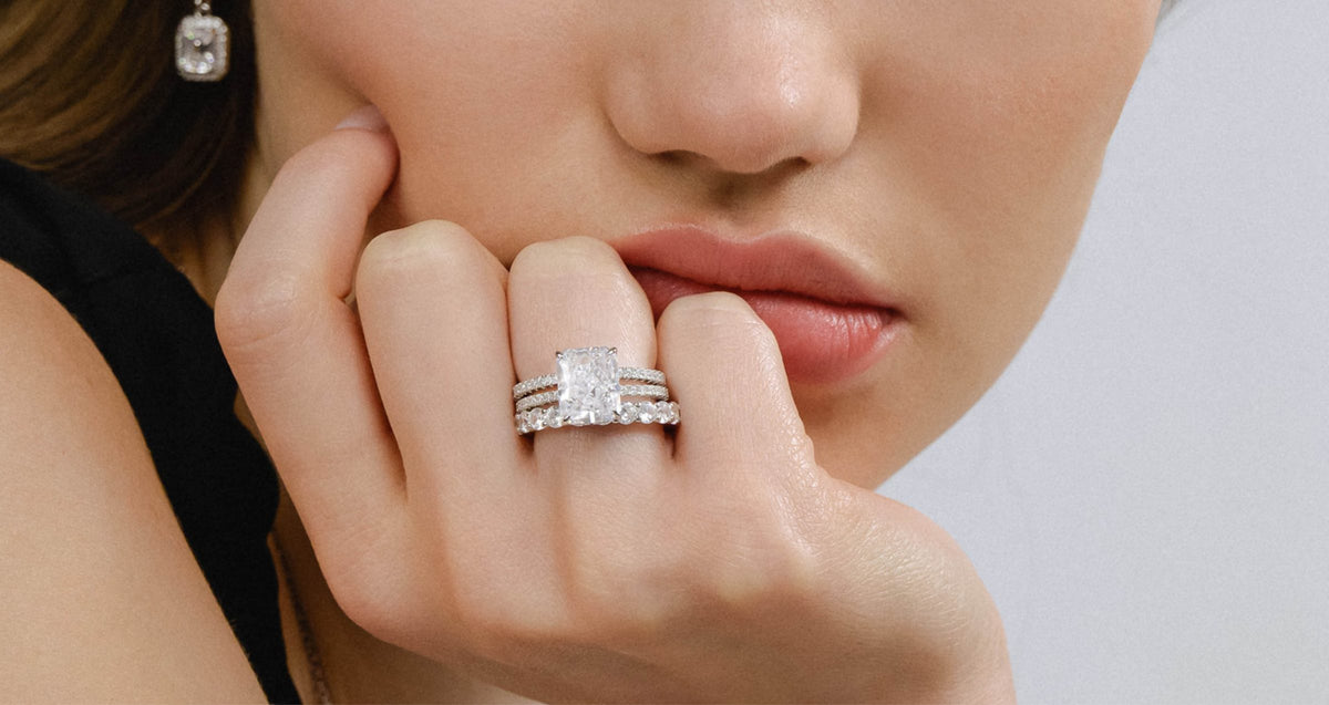 New mum wearing a push present ring and drop earring