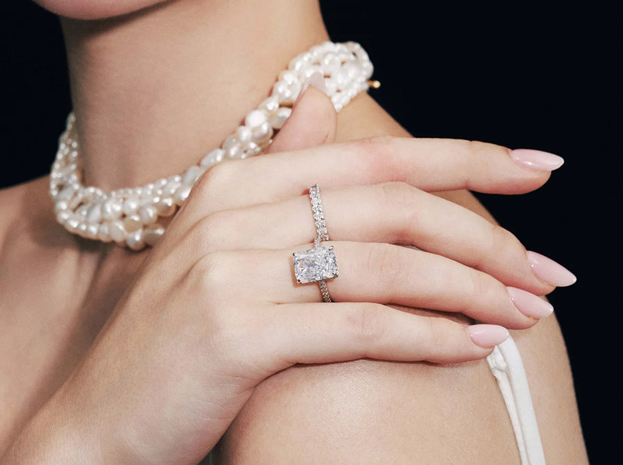 Pearl bracelet and solitaire ring